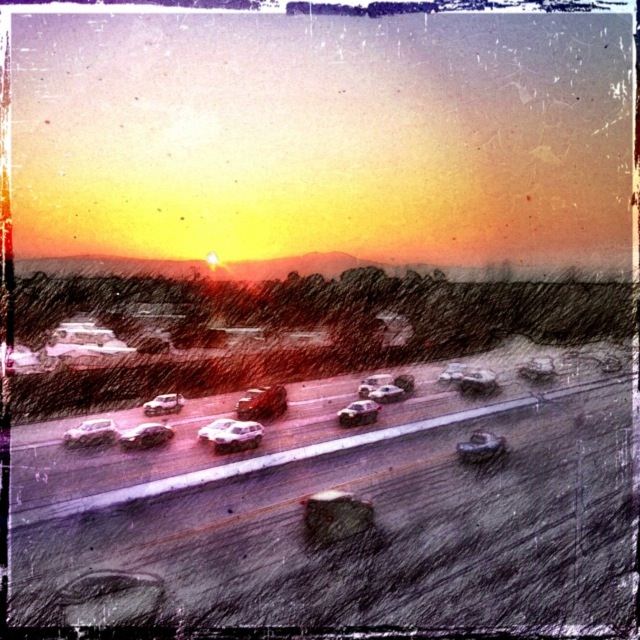 busy sunrise over the 405 freeway